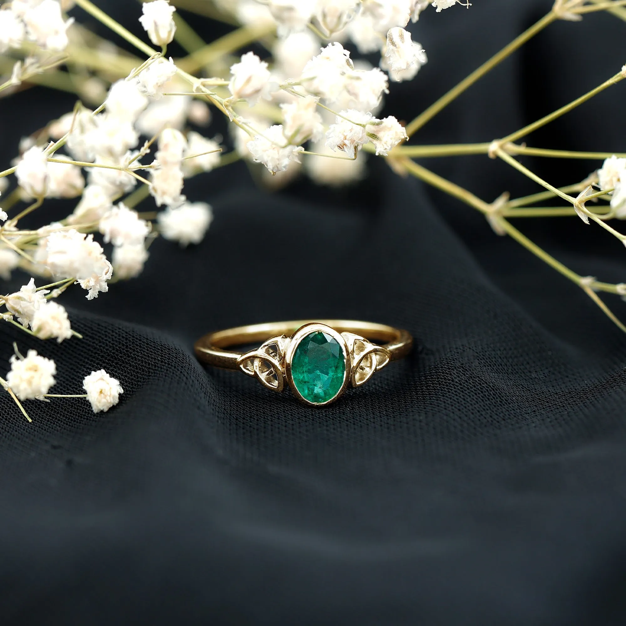 5X7 MM Oval Cut Emerald Solitaire Celtic Ring in Bezel Setting