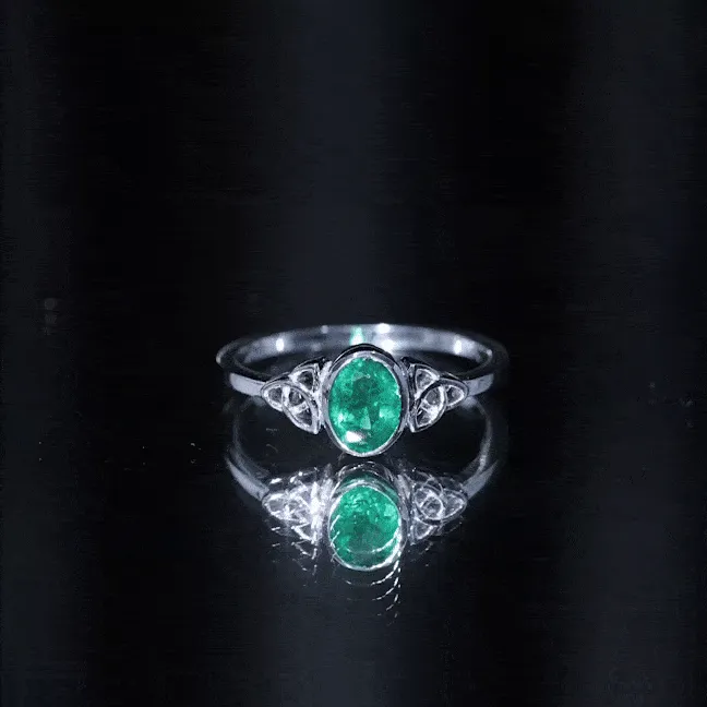 5X7 MM Oval Cut Emerald Solitaire Celtic Ring in Bezel Setting