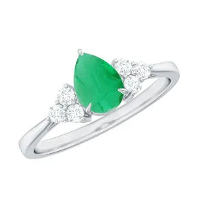 Pear Shaped Emerald Solitaire Ring with Diamond Trio