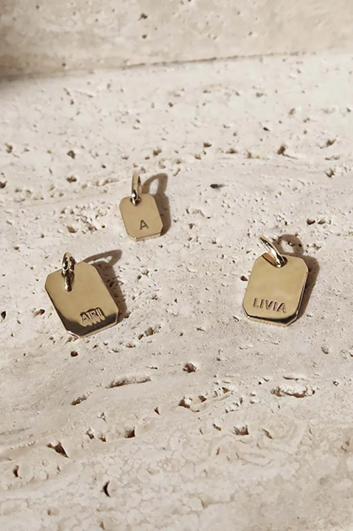 THE LOVE TAG NAME GOLD PENDANT