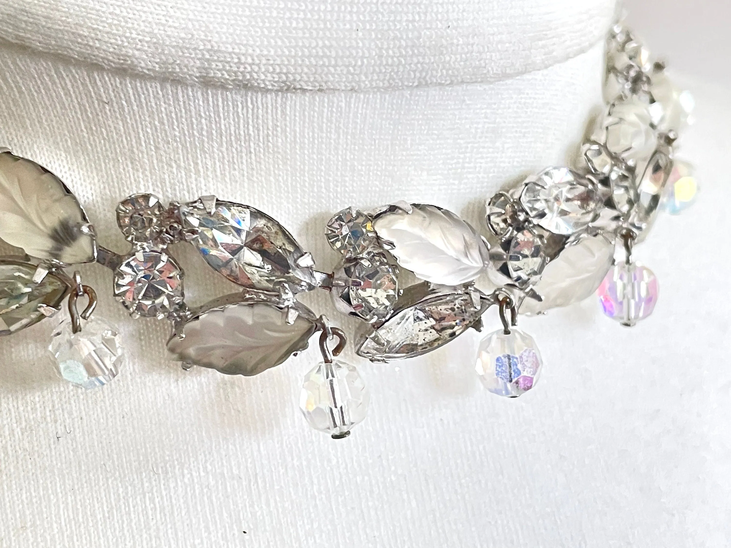 Vintage signed Kramer NY cloudy moulded glass & crystal rhinestone silver tone choker necklace with fringe beading, leaf garland design